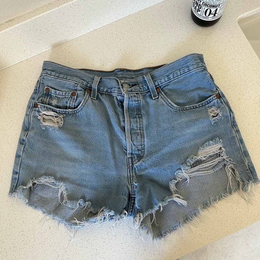 Levi’s 501 distressed button fly denim shorts size 29